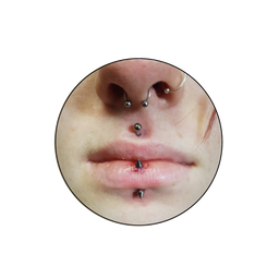 lip and septum piercing by Val the Impaler at Manchester tattoo and piercing company