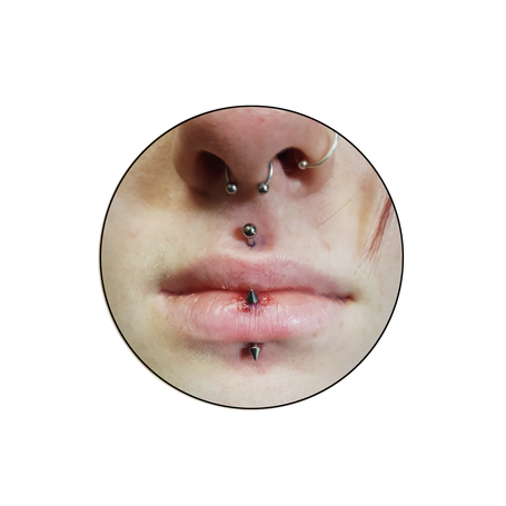 lip and septum piercing by Val the Impaler at Manchester tattoo and piercing company
