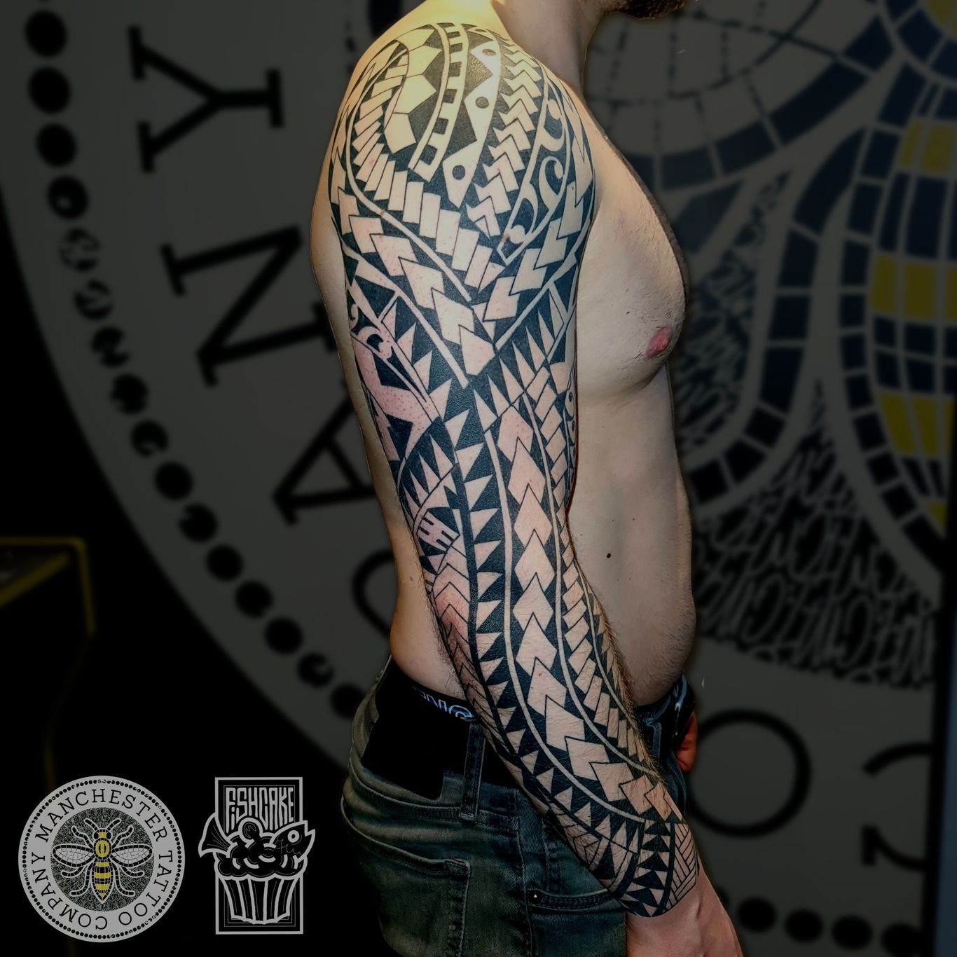 a full sleeve Polynesian freehand tattoo